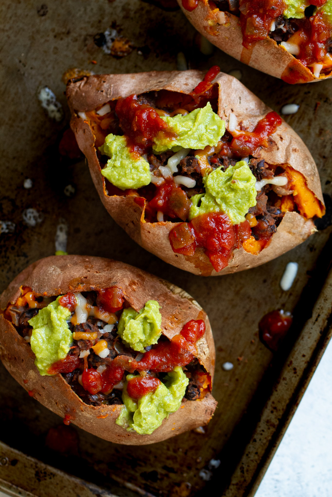 Taco Stuffed Sweet Potatoes Running With Spoons